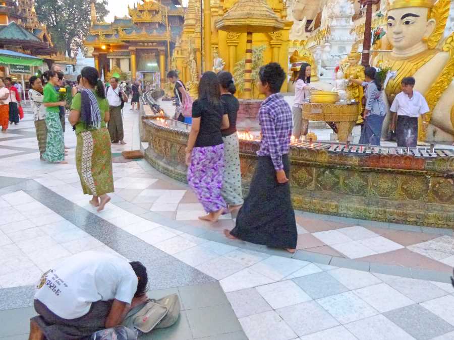 The stupa's plinth is made of bricks covered with gold plates
