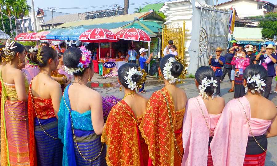 Songkran parade participants pose for a photo