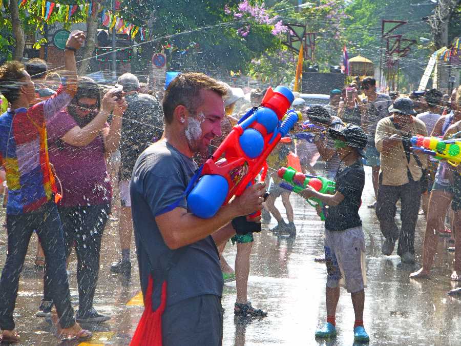 People try to keep camera dry during Songkran