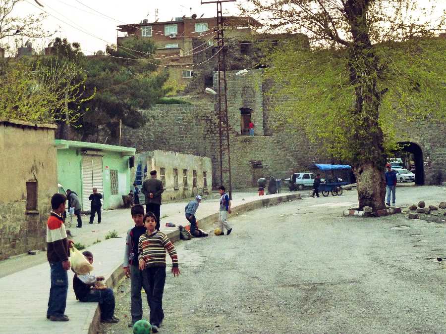 Boys playing football in the old city of Diyarbakir, Turkey