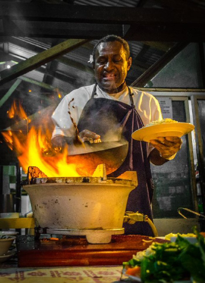 Every night Moses worked his high heat gas burner with a smile that radiated near as much as his flame.
