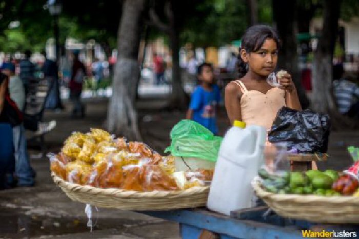 A young girl selling her wares in Granada, Nicaragua.